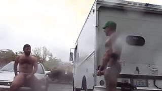 Two strangers masturbate in a public parking lot