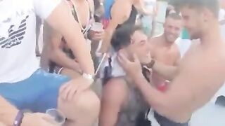 Straight guy performs a strip tease and kisses his friend on a boat